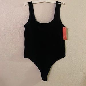 Black thong body suit